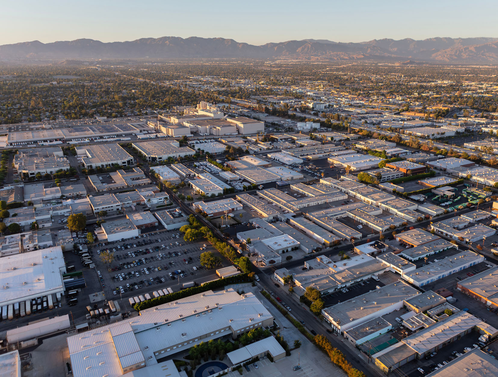 Aerial of the City of Industry industrial corridor at golden hour